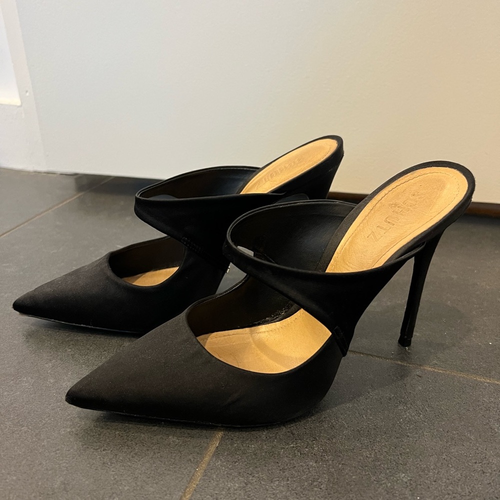 Schutz black pointed toe mules 9.5